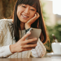 a girl looking at her mobile phone