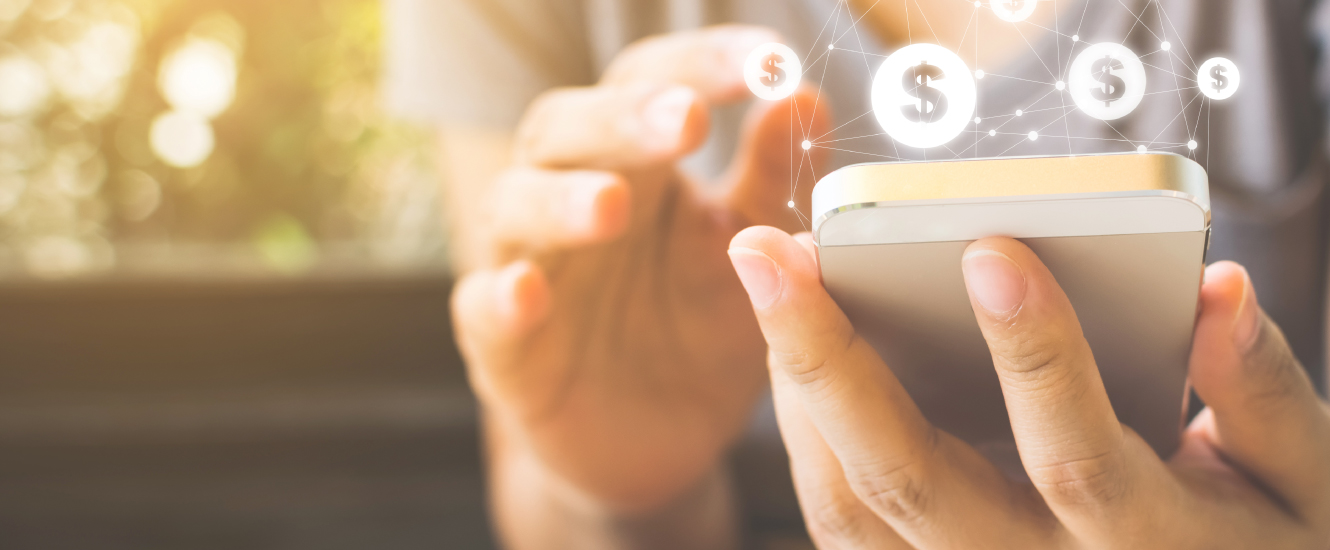 woman using cellphone with bankign graphics