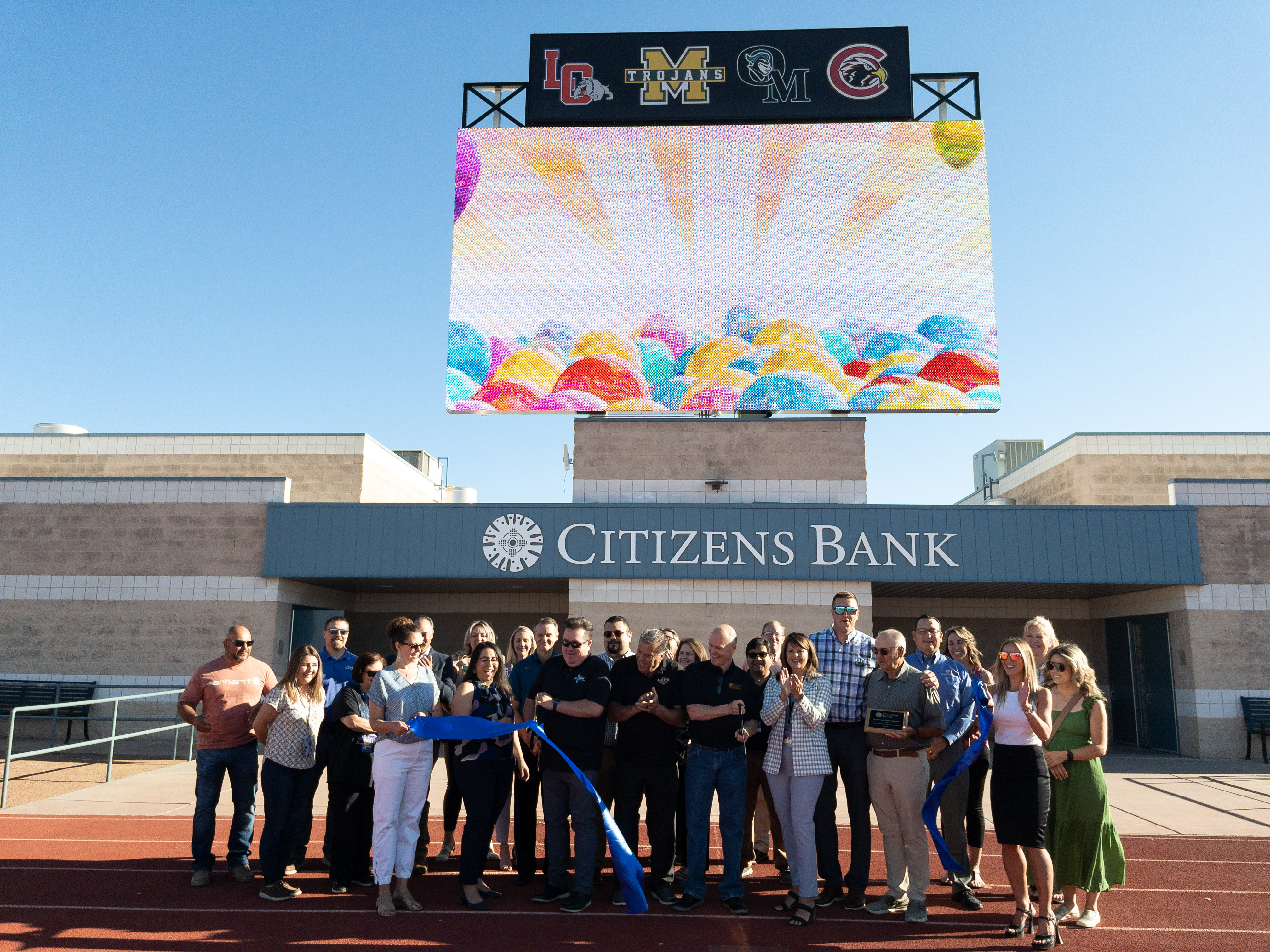 ribbon cutting for Field of Dreams scoreboard
