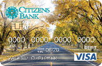 debit card with pecan trees lining a road